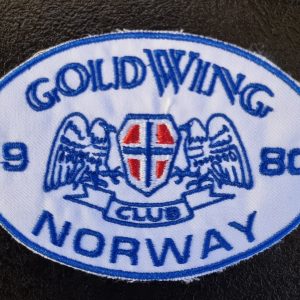 Lite klubbmerke hvit